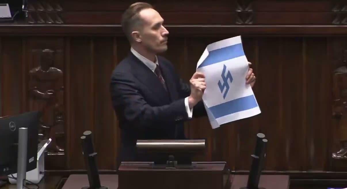 Polish MP unfurled Israeli flag with swastika: ‘Israel is the new Third Reich’